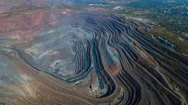 istock Huge iron ore quarry iron ore quarry top view Aero photo shoot. 1565520432