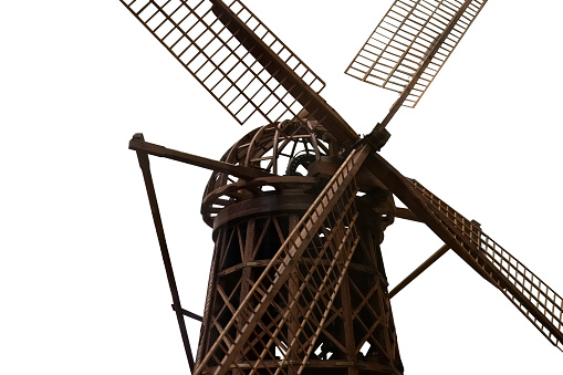 Old wooden mechanical windmill model isolated on white with clipping path. High quality photo