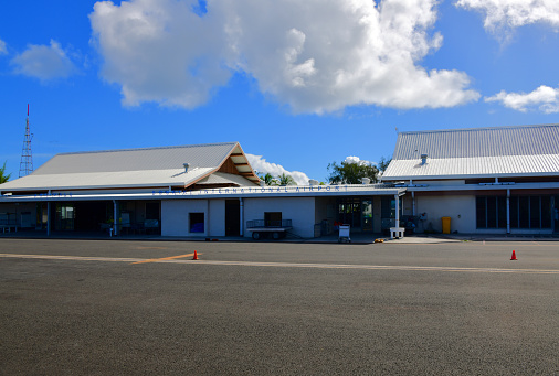 Bonriki, South Tarawa Atoll, Gilbert Islands, Kiribati: Bonriki International Airport - terminal building airside, seen from the apron area. Hub for Kiribati airlines, the flag carrier and Coral Sun Airways.
