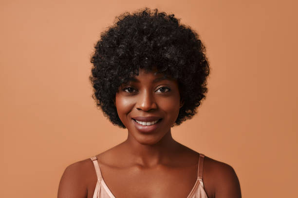 istock Multiethnic women on beige background 1565611073