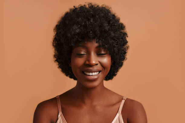istock Multiethnic women on beige background 1565611076