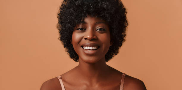 istock Multiethnic women on beige background 1565611078