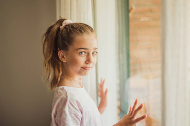 istock DEAF GIRL WITH HEARING AID 1565677377