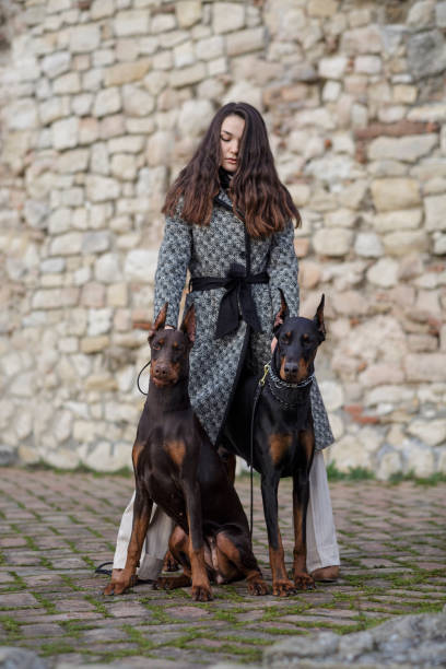 istock Girl with dogs 1565713700