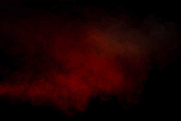 istock Orange and red steam on a black background. 1565723795