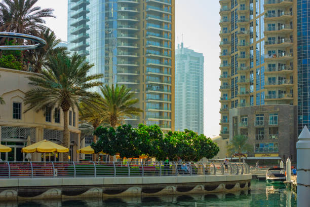 istock High rise buildings and streets in Dubai, UAE 1565738955