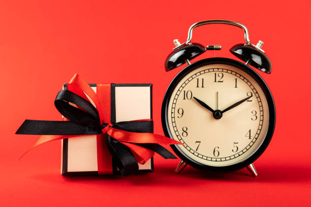 istock gift box  on a red background, time for shopping. 1565750680