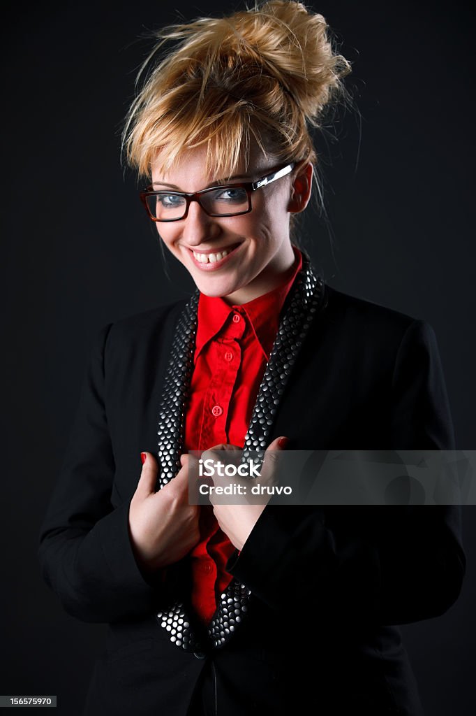 Junge lächelnde Frau in eyeglasses - Lizenzfrei Anzug Stock-Foto
