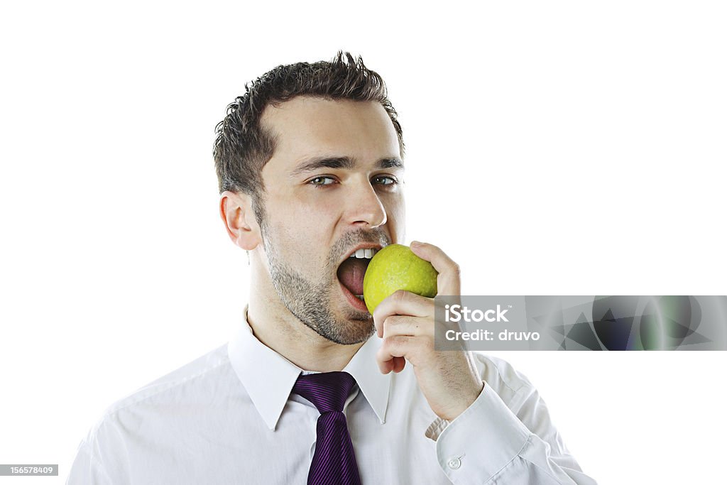 Nahaufnahme des jungen Geschäftsmann beißen einen Apfel - Lizenzfrei Abnehmen Stock-Foto