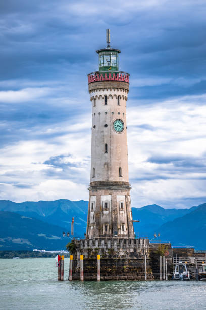 Town of Lindau on Bodensee lake harbor entrance lighthouse view Town of Lindau on Bodensee lake harbor entrance lighthouse view, Bavaria region of Germany lindau lighthouse stock pictures, royalty-free photos & images