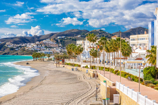 istock Idyllic beach in Nerja landscape view 1565797384