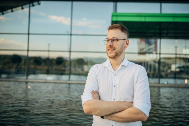 istock A young handsome smiling businessman 1565805154