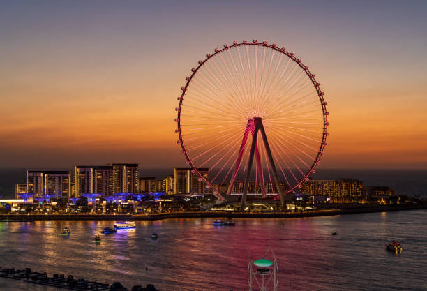 istock Light show on Ain Dubai observation wheel at sunset 1565807895