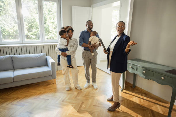 istock Young family buying house 1565815733
