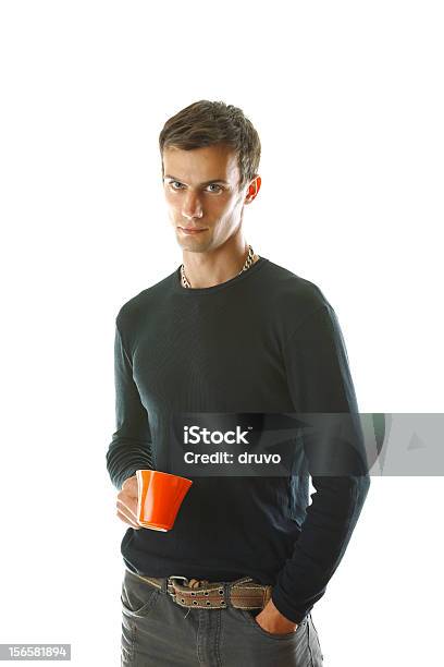 Photo libre de droit de Jeune Homme Avec Une Tasse Dorange banque d'images et plus d'images libres de droit de 25-29 ans - 25-29 ans, Adulte, Adulte d'âge moyen