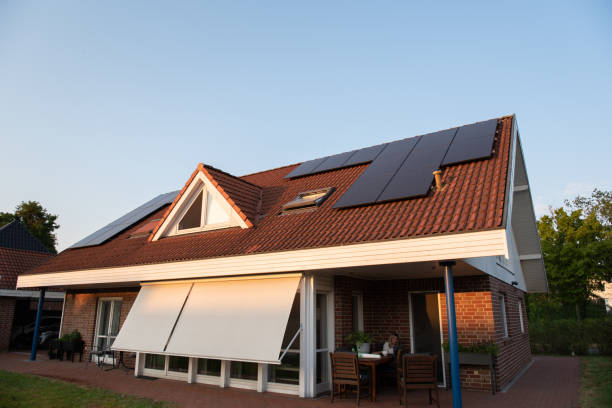Single family house with solar system or photovoltaic system stock photo