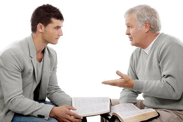 Believer explains God's Words to a young man.