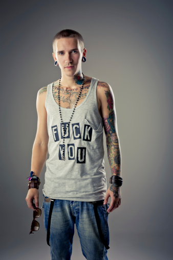 Young male with tattoos.