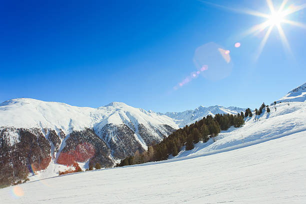 Sun over Italian Alps. Ski Resort Livigno.