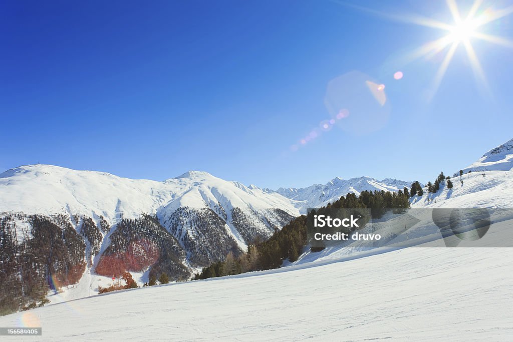 Sun over Italian Alps Sun over Italian Alps. Ski Resort Livigno. Adult Stock Photo