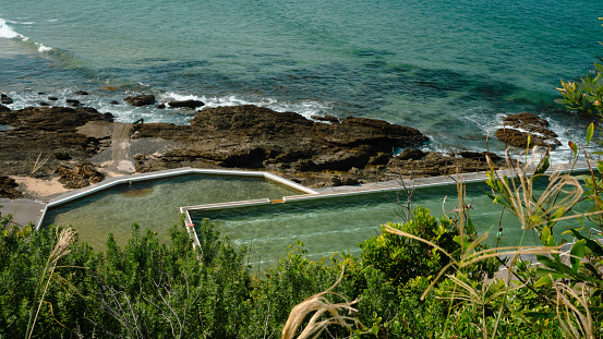 Forster - Tuncurry, New South Wales, Australia, views over the headland blue green clear ocean views, rocky outcrops, cliffs into the ocean, Ocean pools, ocean swimming pools,
