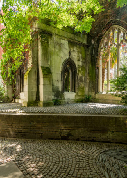 istock Creeping plants over the empty windows of St Dunstan church 1565859235