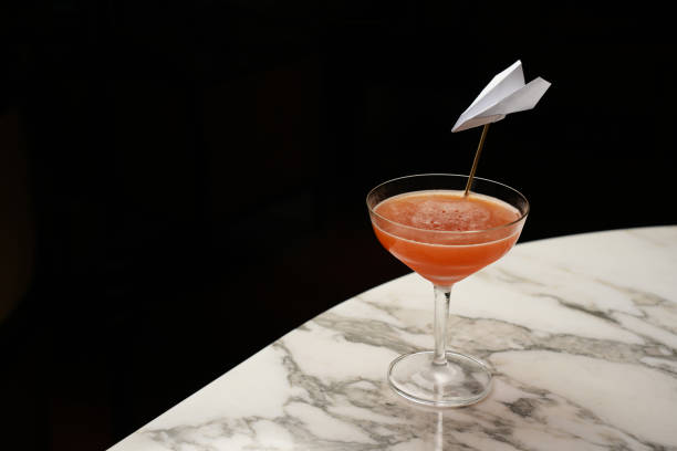 istock Fresh cocktail glass on a marble bar table 1565867622