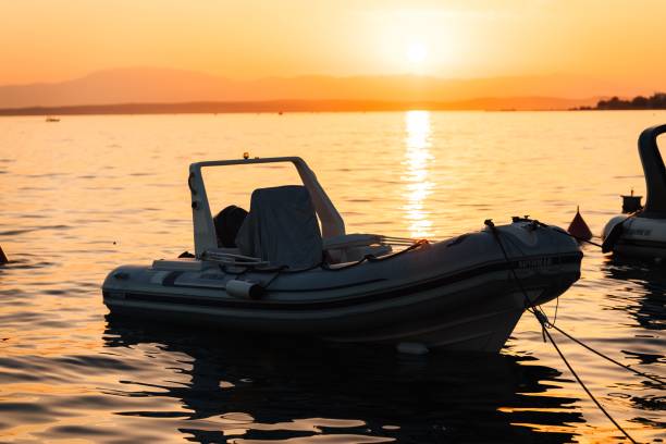 istock Beautiful orange sunset and tranquil water  in Selce, Croatia 1565875192