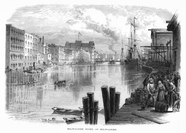 milwaukee river w milwaukee, wisconsin, stany zjednoczone - number of people people in the background flowing water recreational boat stock illustrations