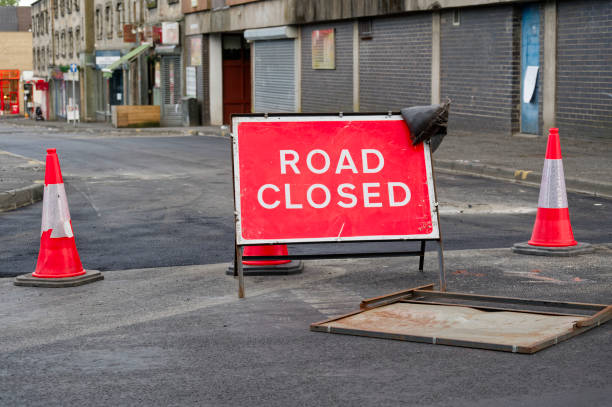 istock Road ahead closed sign and traffic cones 1565920349