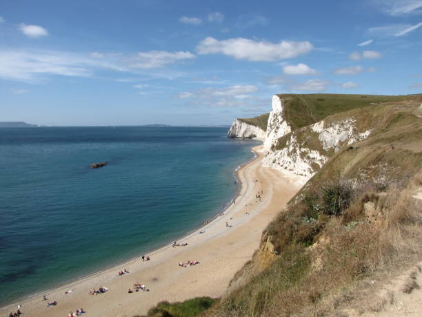 istock the beach and cliffs of the jurassic coast 1565921394