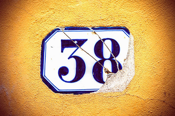 istock Grungy wall texture with number 38 156593855