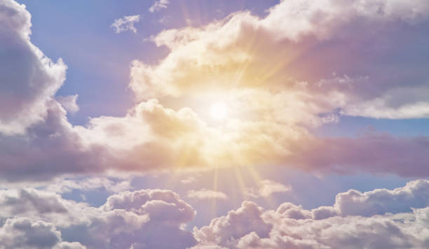 istock Panorama cloudscape of blue sky with fluffy clouds sunlight on clean background, cozy wallpaper. Beauty clear cloudy in sunshine atmospheric backdrop. Design backgrounds concept. Copy ad text space 1565953390