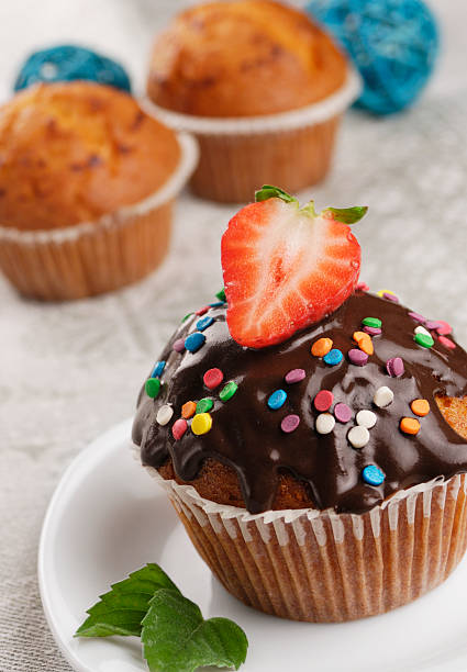 istock Chocolate muffin with strawbarry 156601600