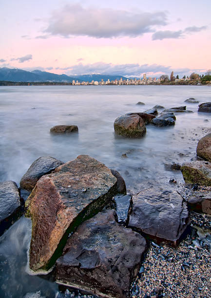 Rocks Large in Foreground with Vancouver Skyline stock photo