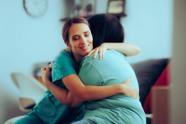 istock Medical Nurse Huggins her Patient Forming a Bond 1566033110