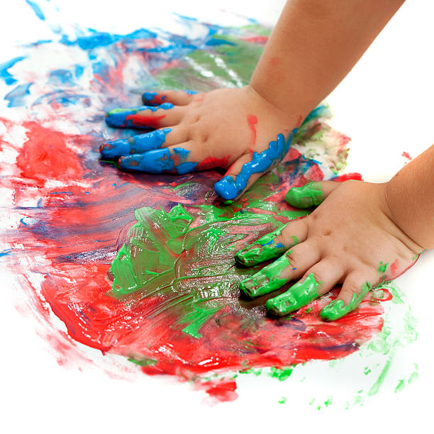 istock Baby hands painting. 156603943