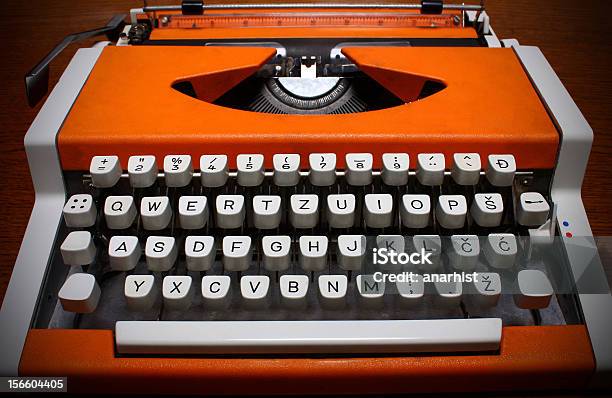 Orange Typewriter Stock Photo - Download Image Now - Antique, Ergonomic Keyboard, Ergonomics