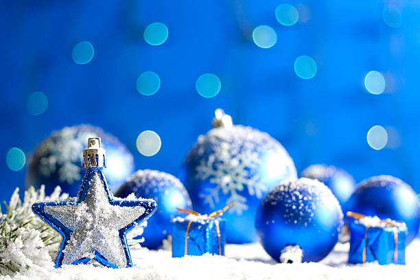 istock Christmas star closeup and baubles on snow 156605747