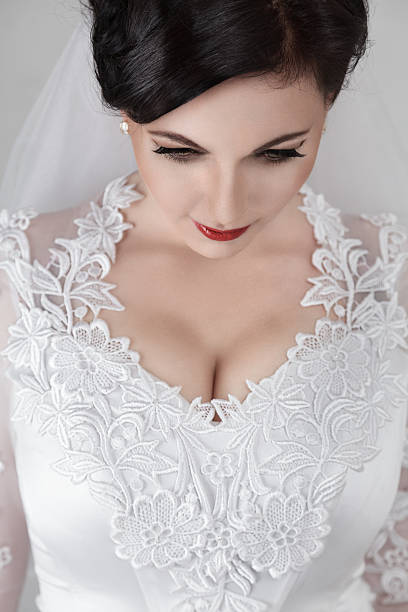 istock Beautiful young bride in wedding dress 156607380