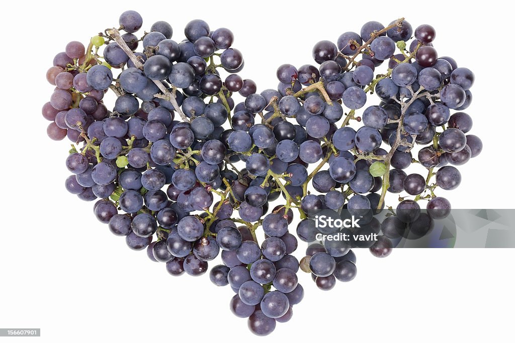 Vine grapes heart concept isolated Heart made from Vine red real simple autumn grapes berries. Studio Shot- NOT isolated image Heart Shape Stock Photo