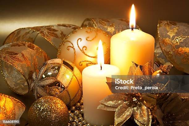 Christmas Decoration With Candles Over Dark Background Stock Photo - Download Image Now