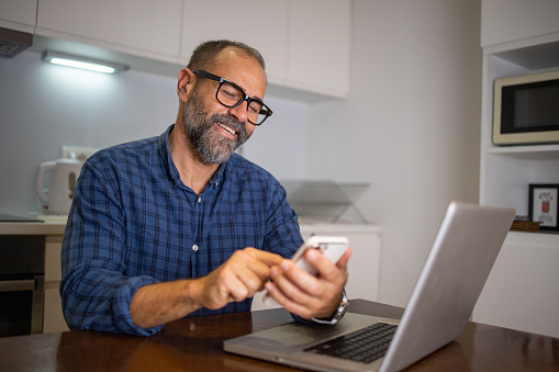 Man shopping online with credit card