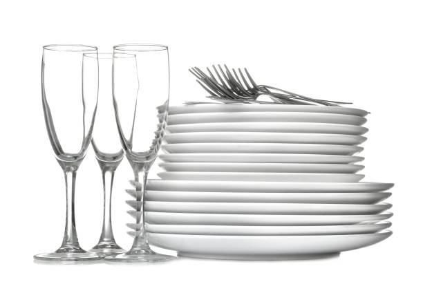 istock A stack of dishes. Dinnerware. plates, kettle and cup on a white isolated background. close-up. 1566112123