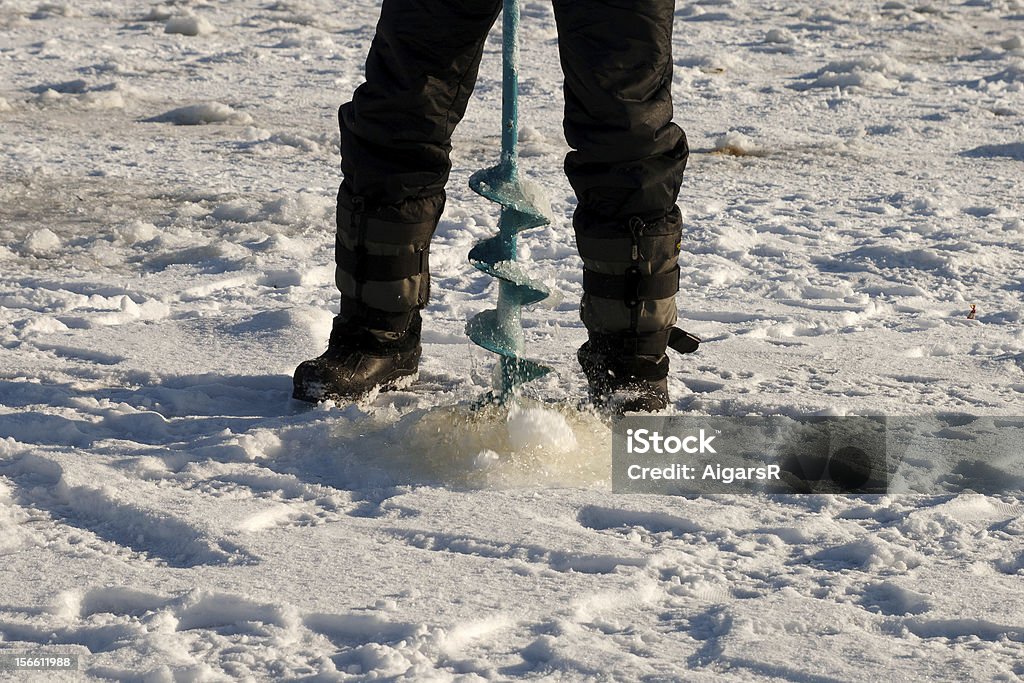 La glace-trou - Photo de Pêche sur la banquise libre de droits