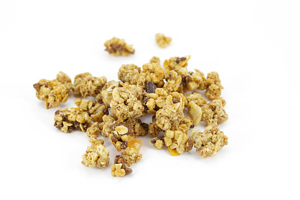 istock Granola made of crisp rolled oats for breakfast, isolated 156614209