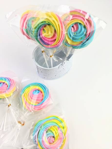 istock candy and cookies with christmas decoration on white isolated background 1566143072