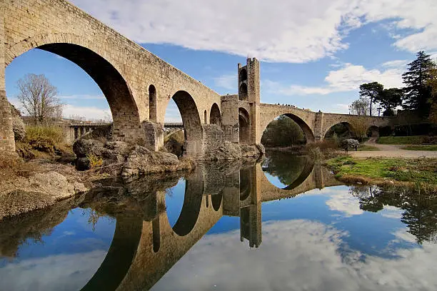 Romanesque bridge over the Fluvia river at Besalu, Girona, Catalonia.