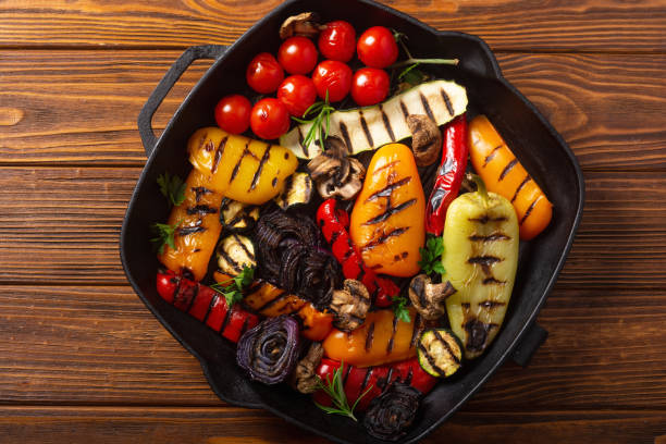 istock Colorful grilled vegetables on a pan barbecue 1566150940