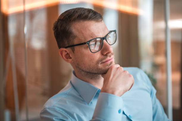 istock Caucasian Human Resources Manager Wearing Eyeglasses In A Modern Office 1566159940
